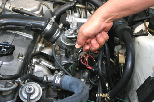 Reinsert the clean dipstick into the engine until the handle is fully seated in the dipstick tube.